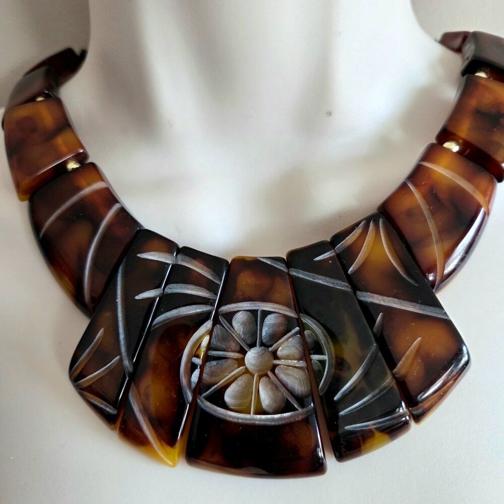 Vintage midcentury retro plastic necklace/choker with carved floral design.